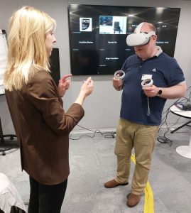 Anne Tsjornaja demonstrating her Research Workshop VR artwork visualisation to Nick Lambert