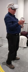 Graham Diprose trying a VR demonstration at EVA London 2022
